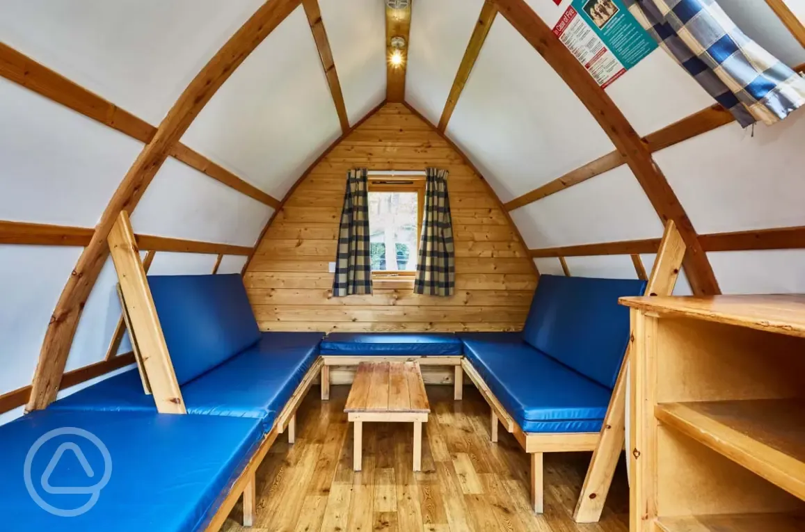 Dog friendly camping pod interior of camp beds Dog friendly camping pod interior of camp beds