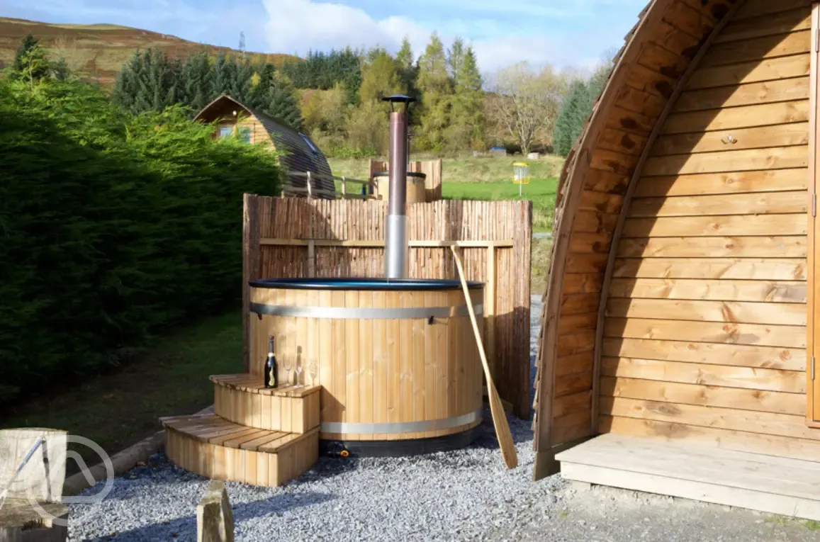 Premium ensuite glamping pod with a private wood fired hot tubs Premium ensuite glamping pod with a private wood fired hot tubs
