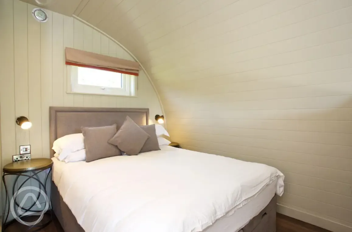 Superior pod double bed (bedding included) Superior pod double bed (bedding included)