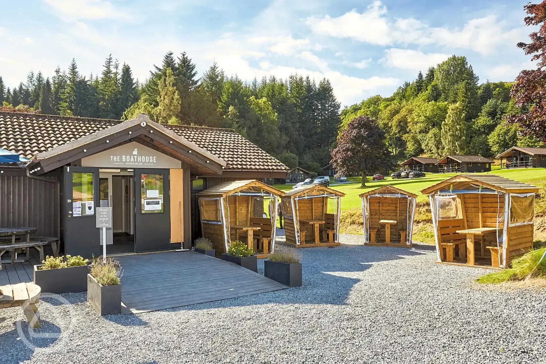 The Boathouse Kitchen and Bar outdoor seating The Boathouse Kitchen and Bar outdoor seating