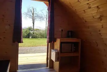 Camping pod interior and outdoor view Camping pod interior and outdoor view