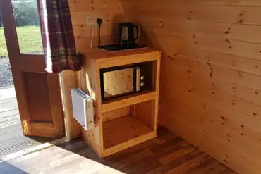 Camping pod equipped with kettle and microwave