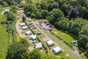 View of the fully serviced pitches, pods, and grass pitches at Hele Valley 