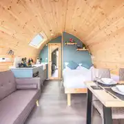 Large Gold glamping pod interior