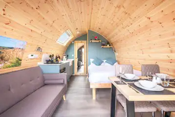 Large Gold glamping pod interior