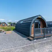 Large gold ensuite glamping pod exterior