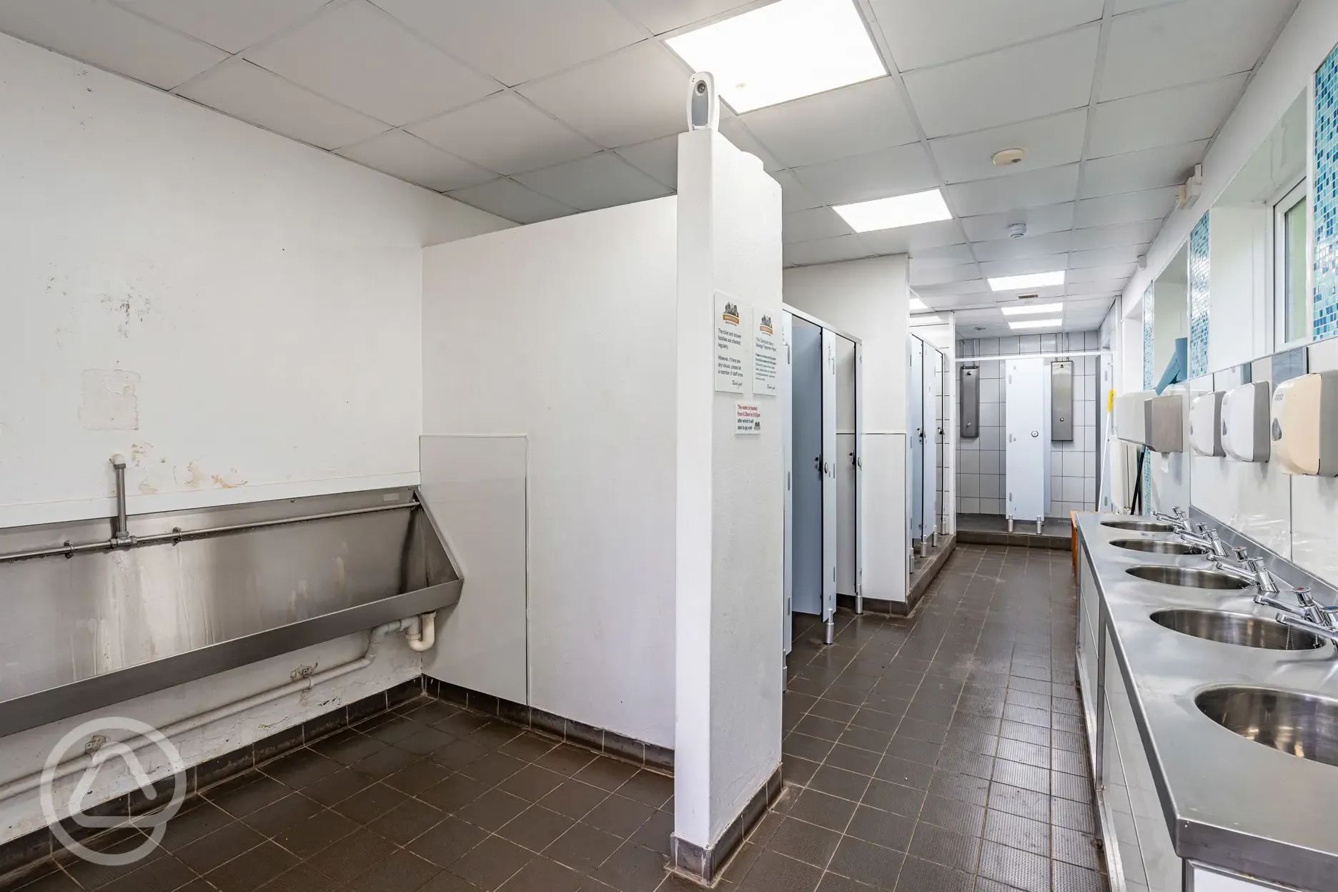 Male toilets with urinals and cubicles