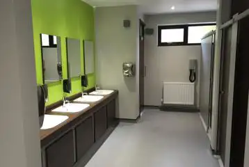 Modern toilet and shower blocks with hair dryers