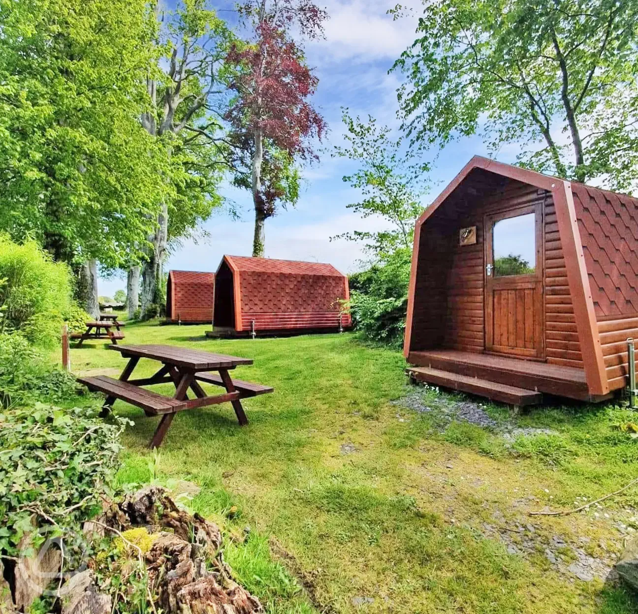 Camping pods located in a private part of the site with picnic benches Camping pods located in a private part of the site with picnic benches