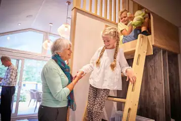 Forest glamping pod stairs to mezzanine bunk area Forest glamping pod stairs to mezzanine bunk area