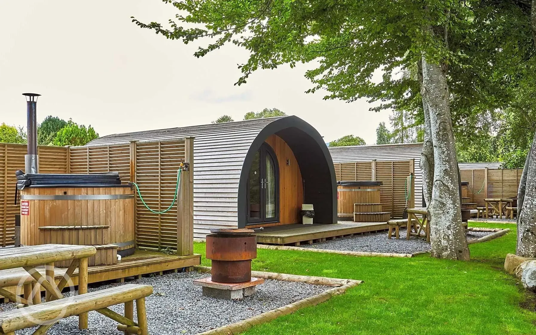 Superior ensuite glamping pods with wood fired hot tubs