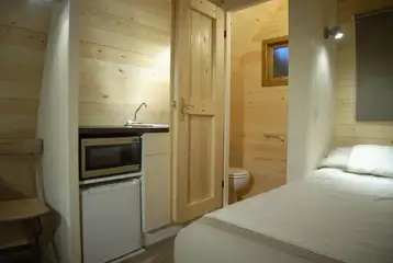 Ensuite glamping pod kitchen and ensuite loo (shared showers) Ensuite glamping pod kitchen and ensuite loo (shared showers)