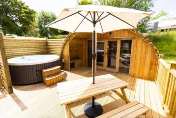 Ensuite glamping pod with hot tub and private decking area Ensuite glamping pod with hot tub and private decking area
