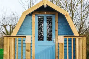 Camping pod with electric and a heater, with shared facilities nearby