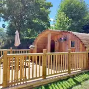 Glamping pod with hot tub exterior with private decking and hot tub Glamping pod with hot tub exterior with private decking and hot tub