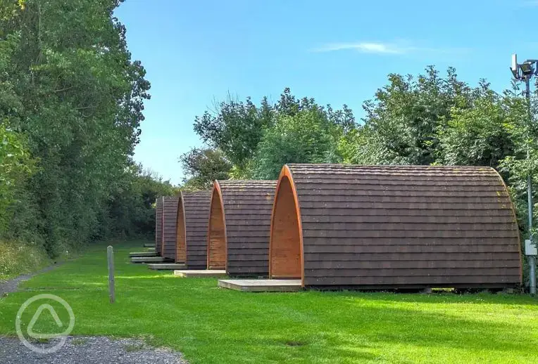 Camping pods, unfurnished with an electric heater, electricity and lighting