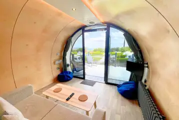 Super glamping pod sofa, TV and bean bags