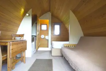 Mega glamping pod with a double bed, sofa bed, kitchenette and ensuite