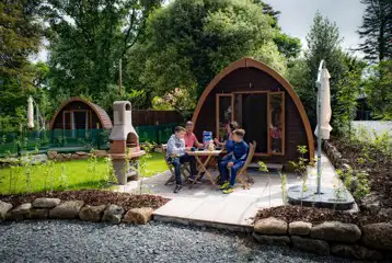 Mega glamping pod with a picnic bench, a parasol, and a BBQ Mega glamping pod with a picnic bench, a parasol, and a BBQ