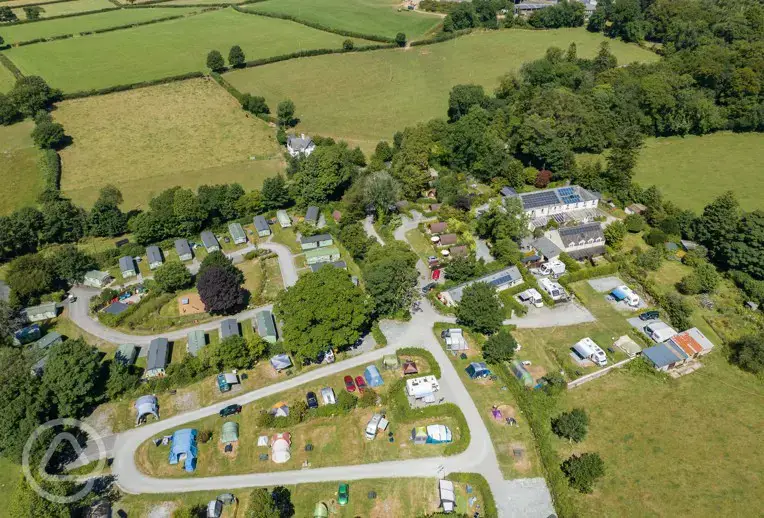 Aerial of Langstone Manor Holiday Park overlooking the pitches and pods