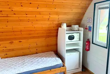 Six person camping pod interior kitchenette