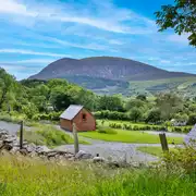 Pods and campsite with scenic mountain views Pods and campsite with scenic mountain views