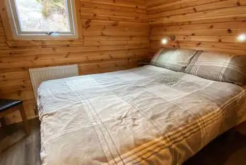 Executive glamping pod bedroom