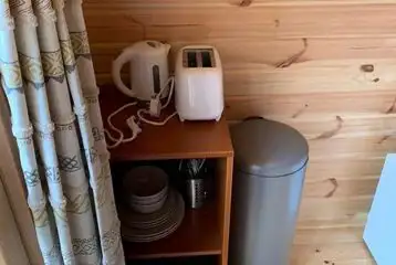 Small pod kitchen appliances, including toaster, kettle and crockery Small pod kitchen appliances, including toaster, kettle and crockery