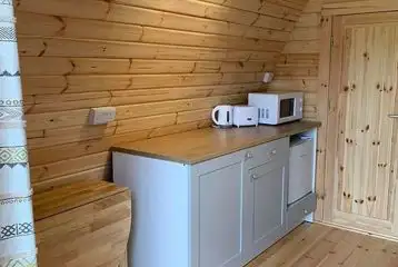 Large camping pod kitchen with kettle, toaster and microwave Large camping pod kitchen with kettle, toaster and microwave