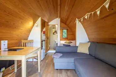 Four person pod with a double bed and double soda bed (bring own bedding)