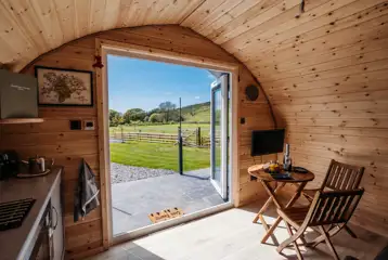 Luxury ensuite glamping pod living area