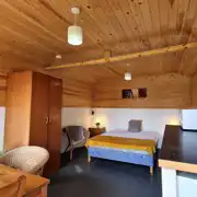 Two person Hill View huts at Budle Bay with a double bed and kitchenette