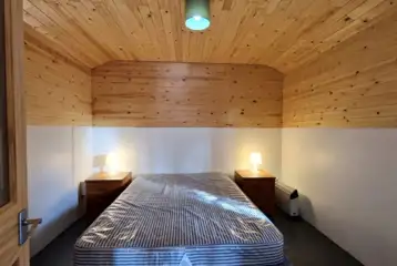Hill View hut - two person interior double bedroom (bedding not included)