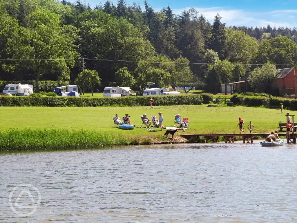 Guests enjoying the onsite lake