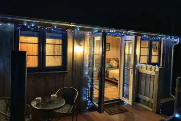 Glamping cabin at night