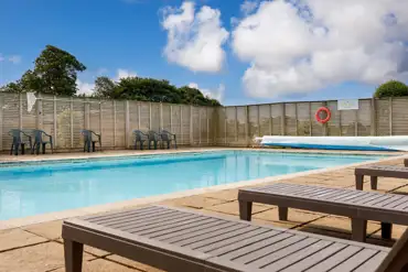 Outdoor heated swimming pool at Meadow Lakes Holiday Park, open May to September