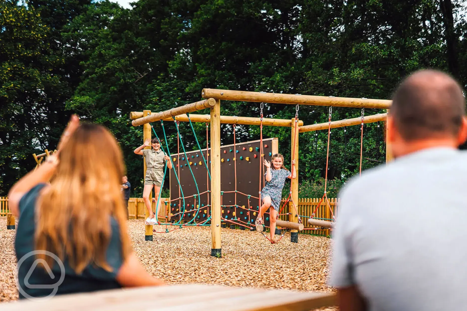 Outdoor play area with a rope course