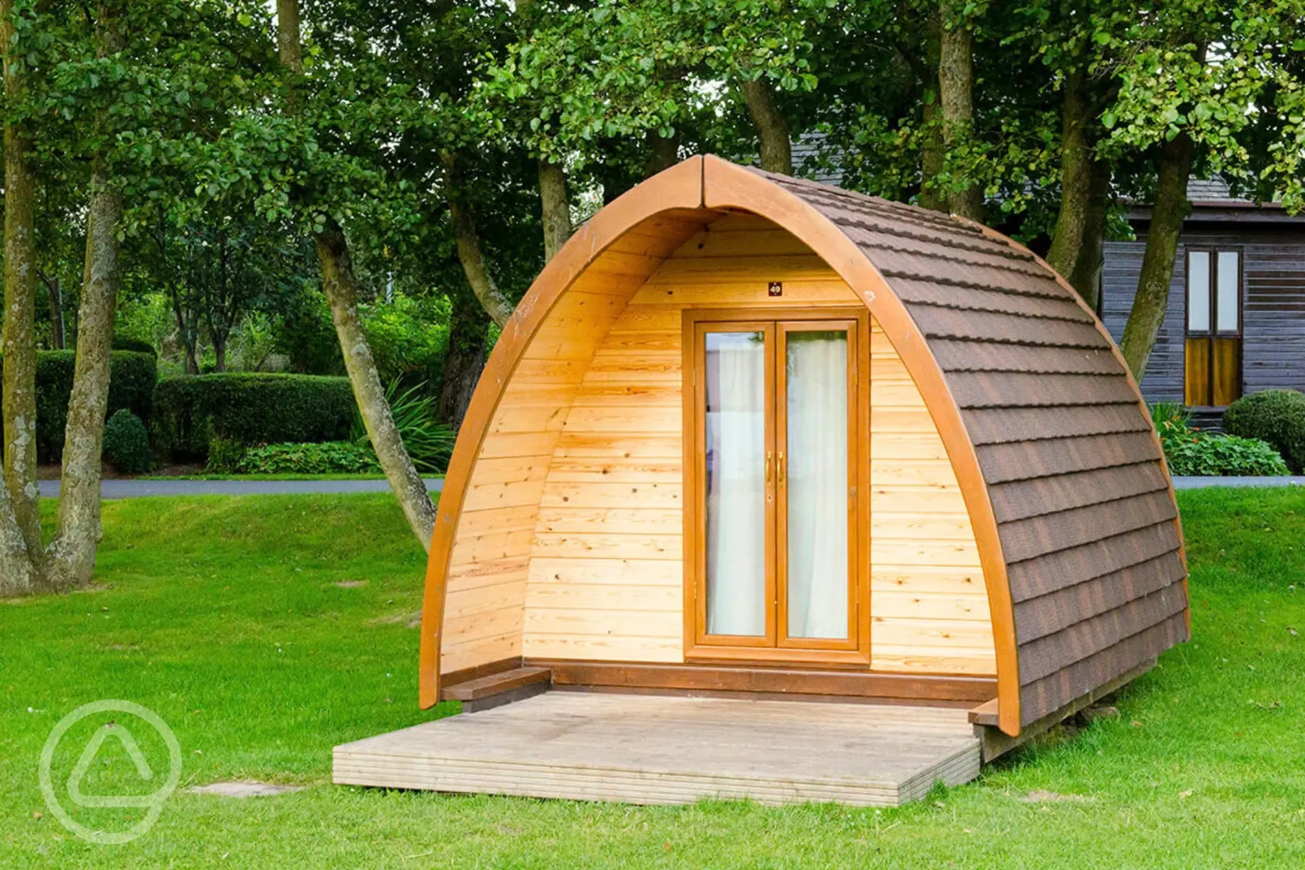 Camping pod with a decked outdoor area