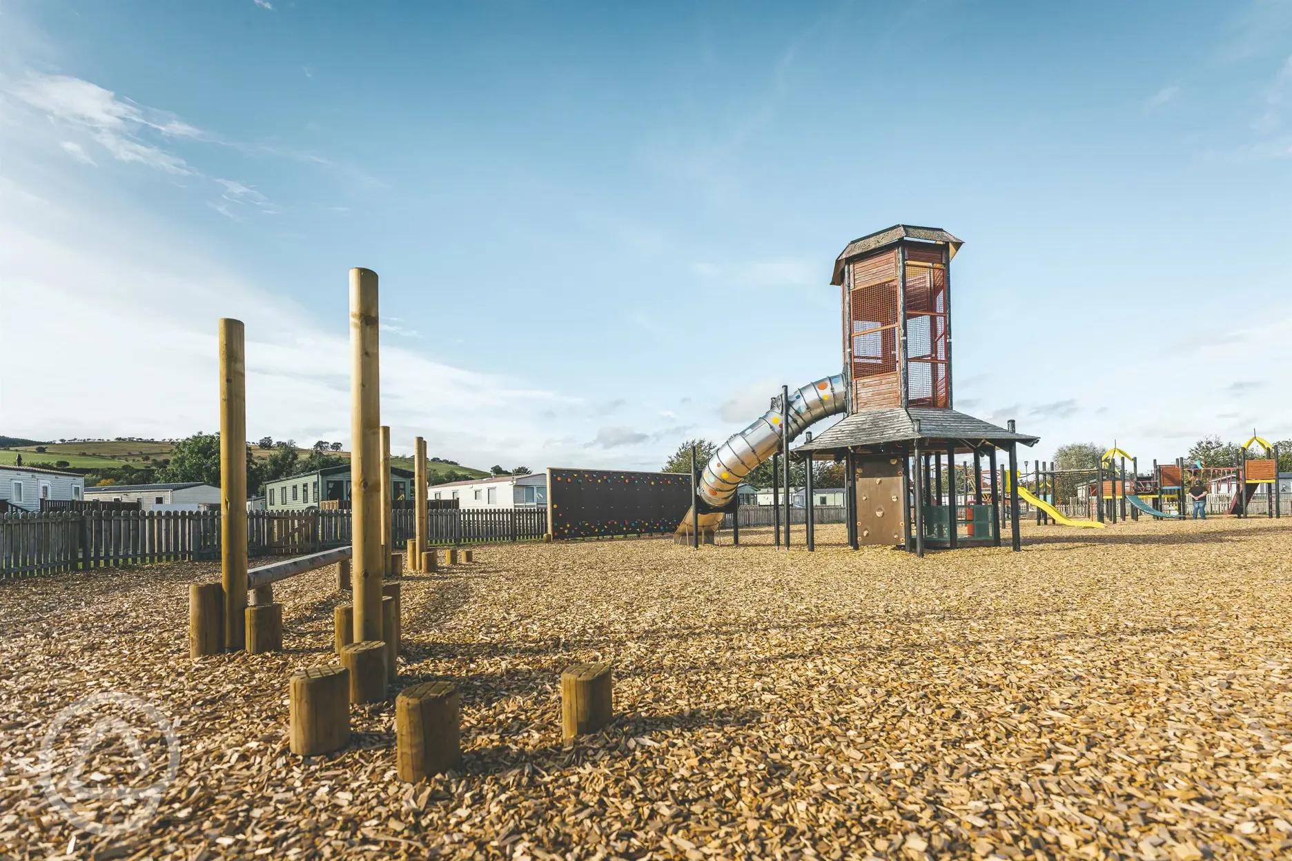 Outdoor play area with a wooden course