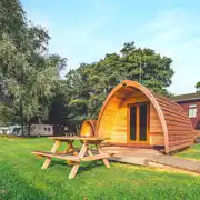 Camping pod with a decked outdoor area