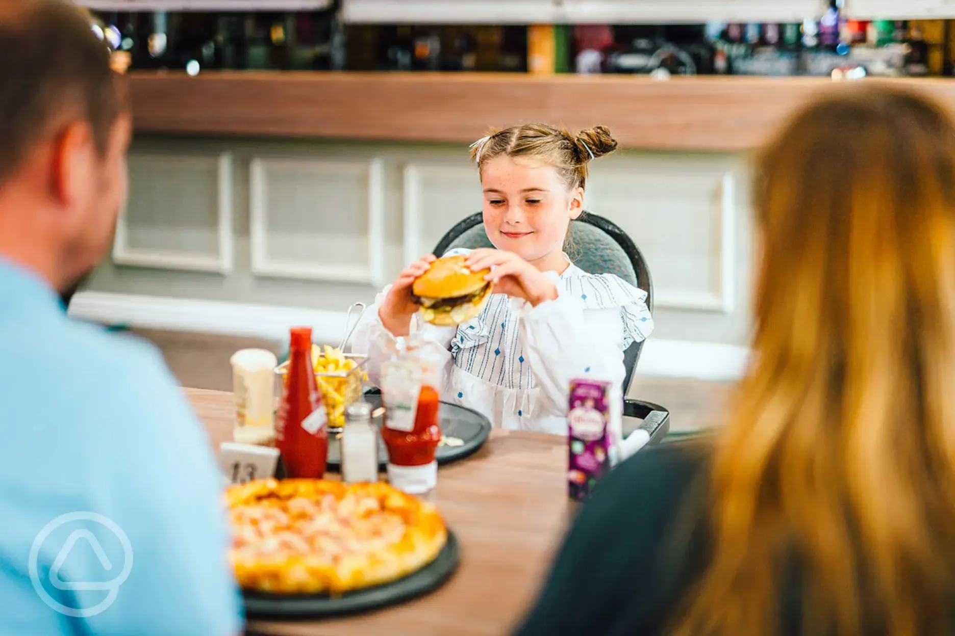 Riverside Bar and Grill - menu includes options like pizza and burgers