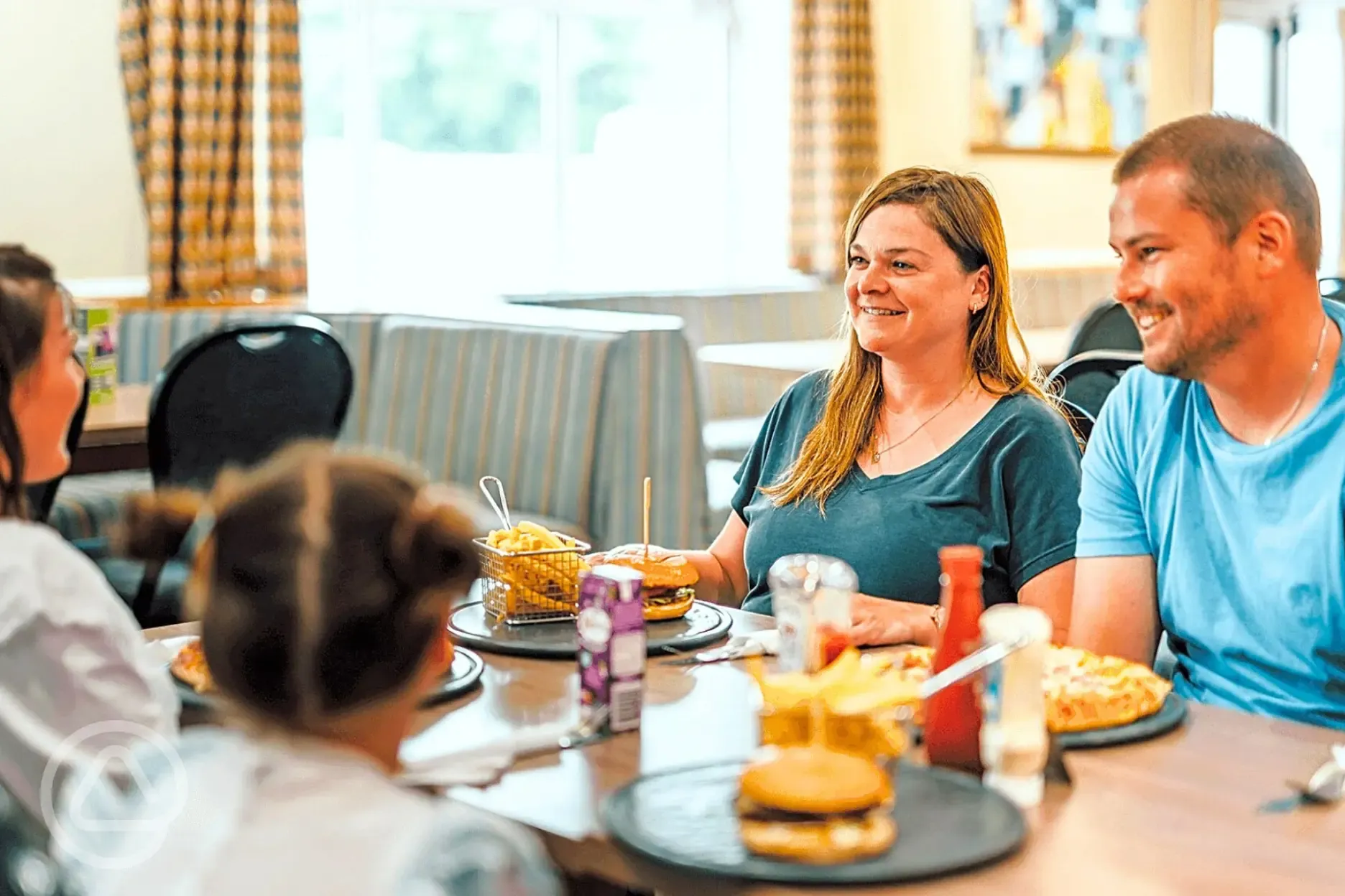 Riverside Bar and Grill - menu includes options like pizza and burgers