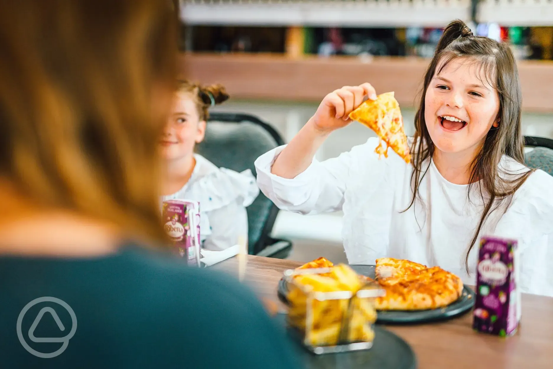 Riverside Bar and Grill - menu includes options like pizza and burgers