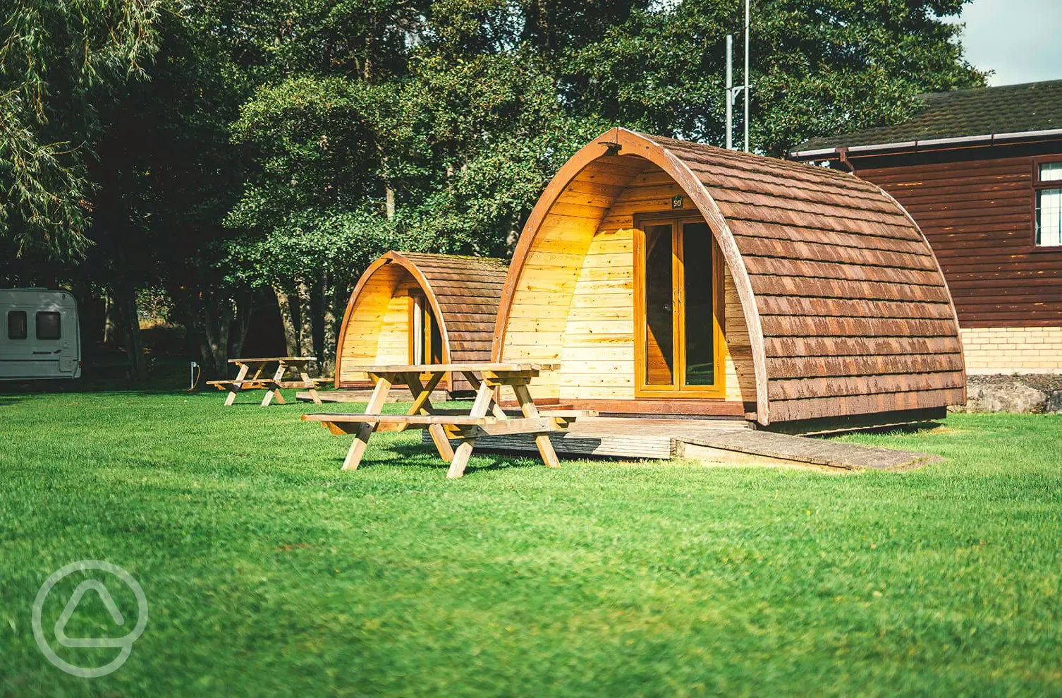 Camping pods with picnic benches