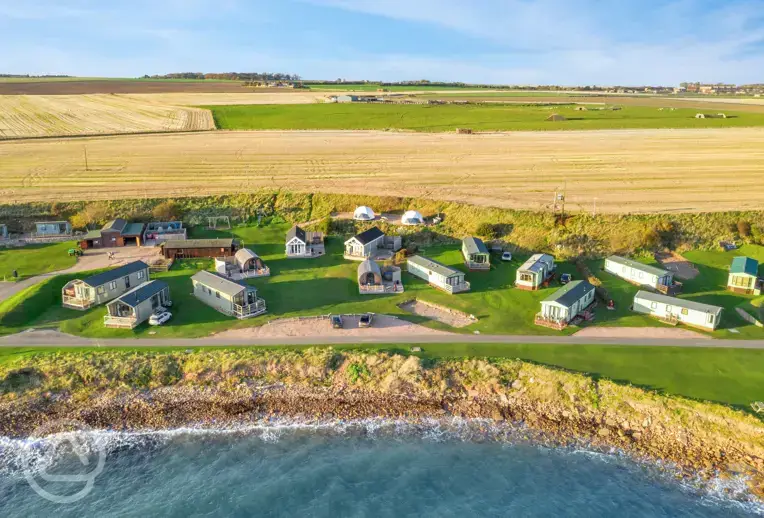 Aerial of the glamping units at Sauchope Links Park on the Fife Coast