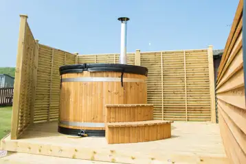 Superior ensuite glamping pod with wood-fired hot tub