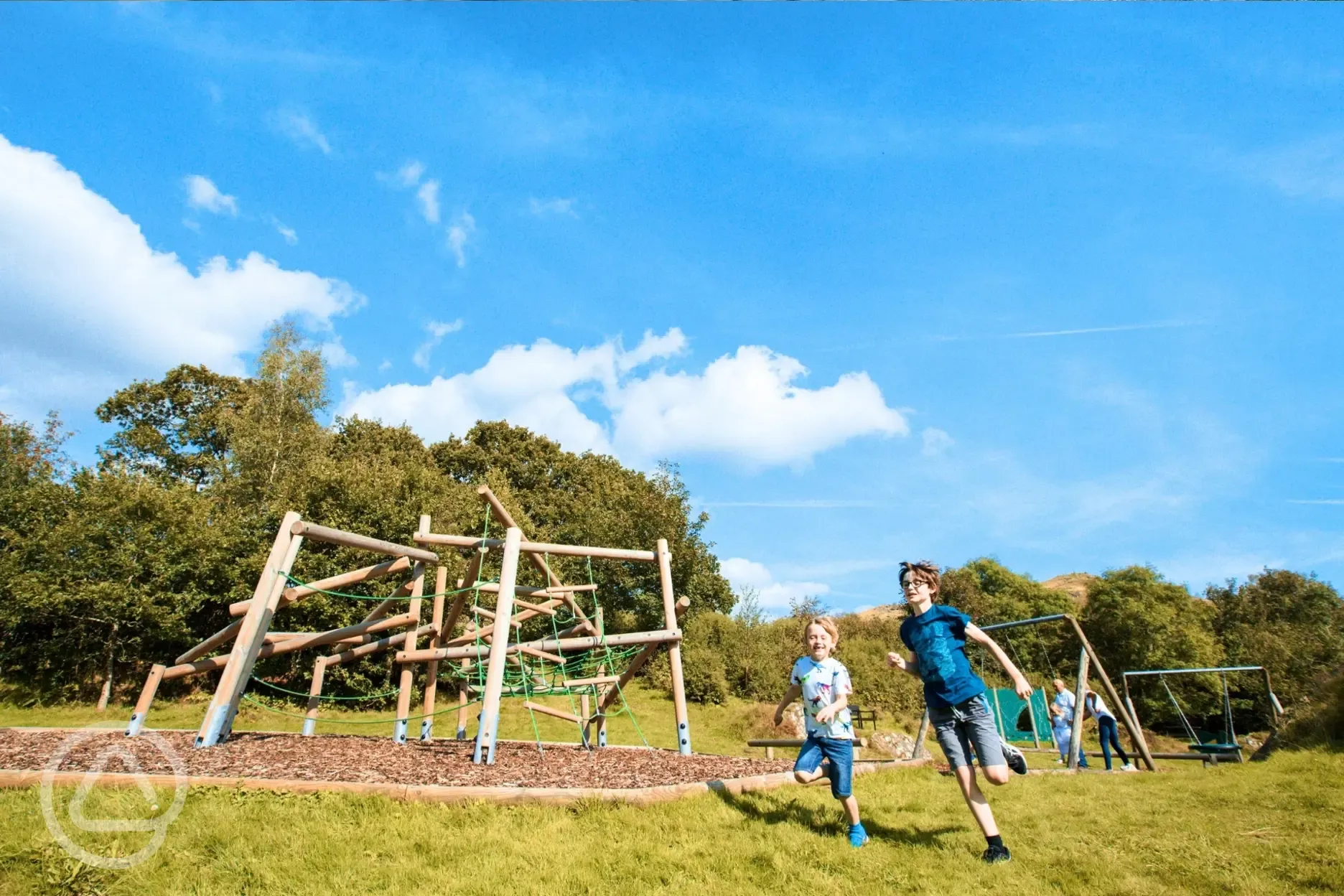 Play park with a wooden climbing frame