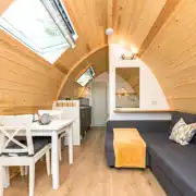 Deluxe glamping pod with a seating area, double sofa bed and seating Deluxe glamping pod with a seating area, double sofa bed and seating