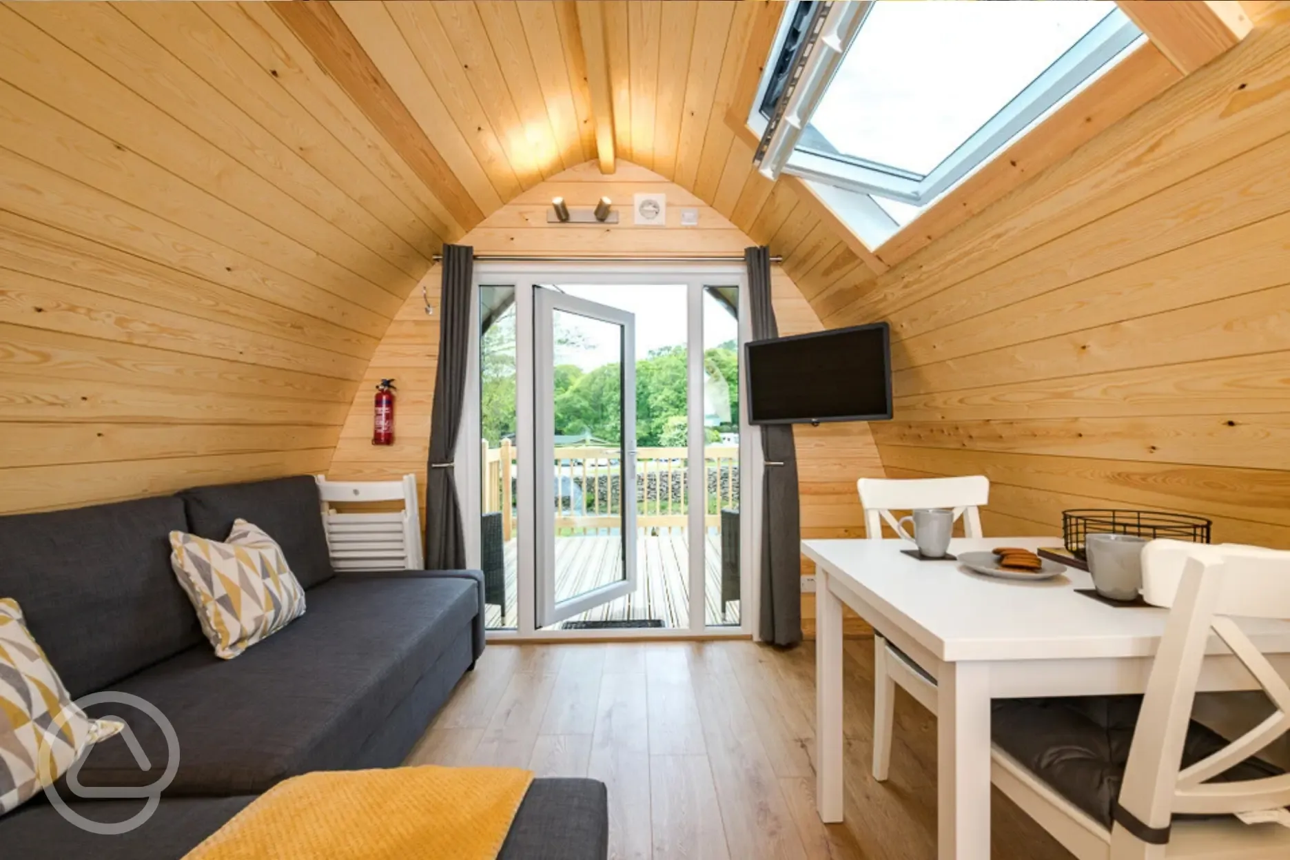 Deluxe glamping pod double sofa bed (bring bedding) and seating area