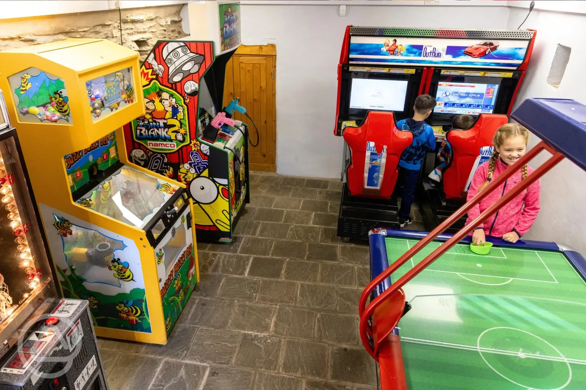 Games room including air hockey and arcade machines